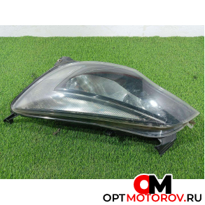 Фара левая  Opel Astra J 2012 13371597 #1