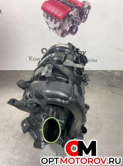 Впускной коллектор  Opel Astra 2009 55563664             #2