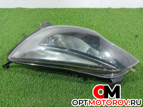 Фара левая  Opel Astra J 2012 13371597 #1